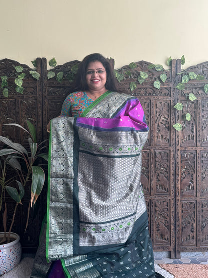 Gadwal Pattu Saree Purple colored saree complemented with a Black Zari border - Sampradaya Designer Studio