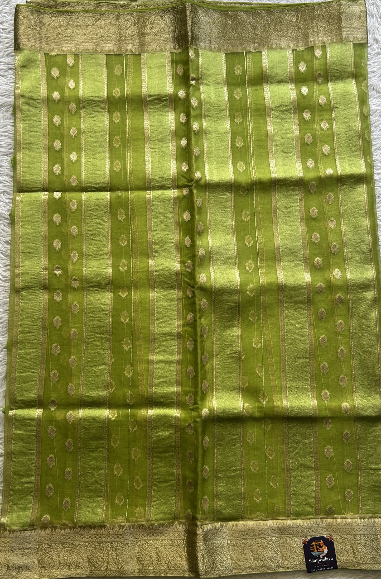 Semi Raw Silk Saree Parrot Green Colored Exquisite with a Zari Border. - Sampradaya Designer Studio