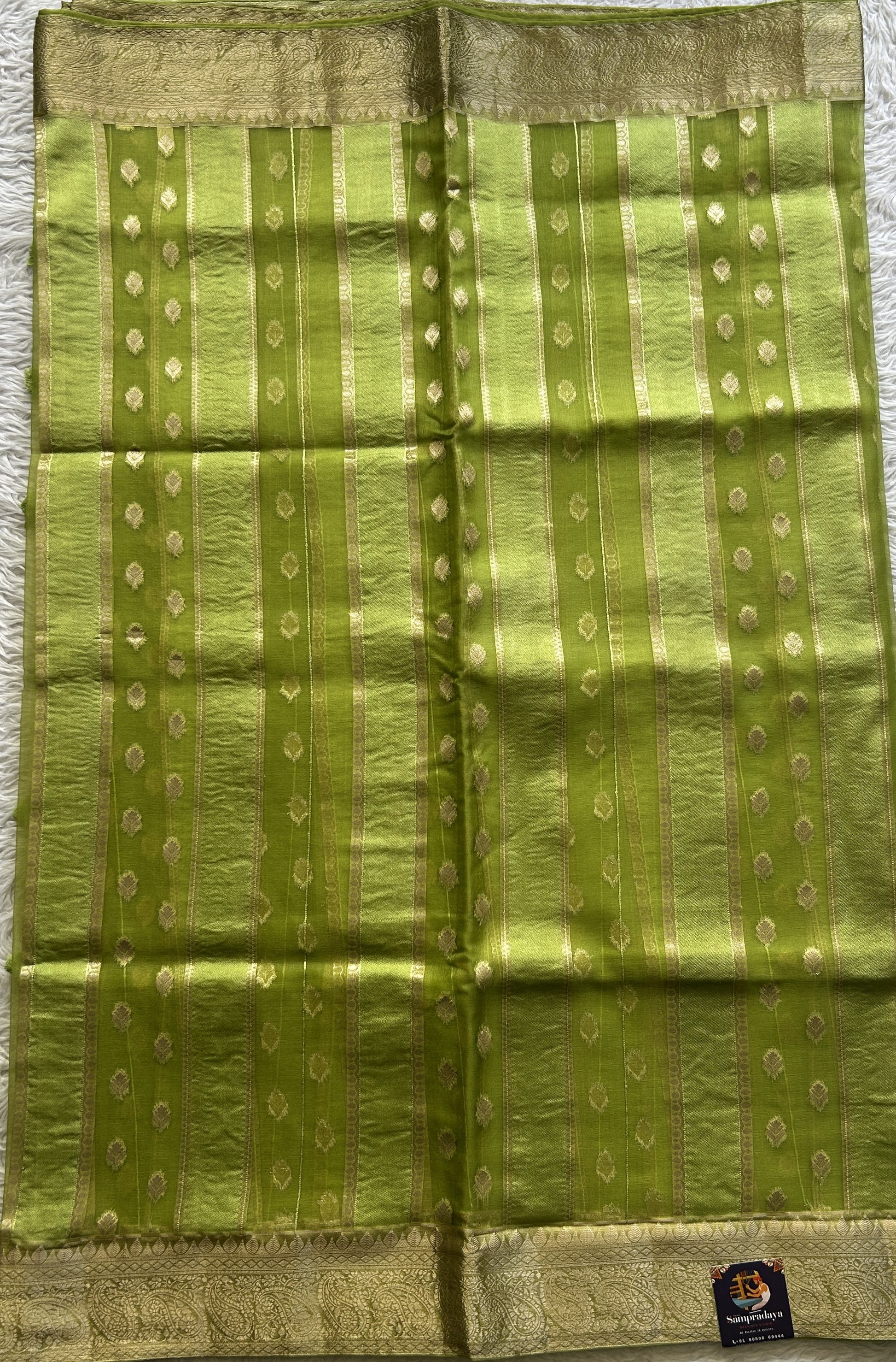 Semi Raw Silk Saree Parrot Green Colored Exquisite with a Zari Border. - Sampradaya Designer Studio