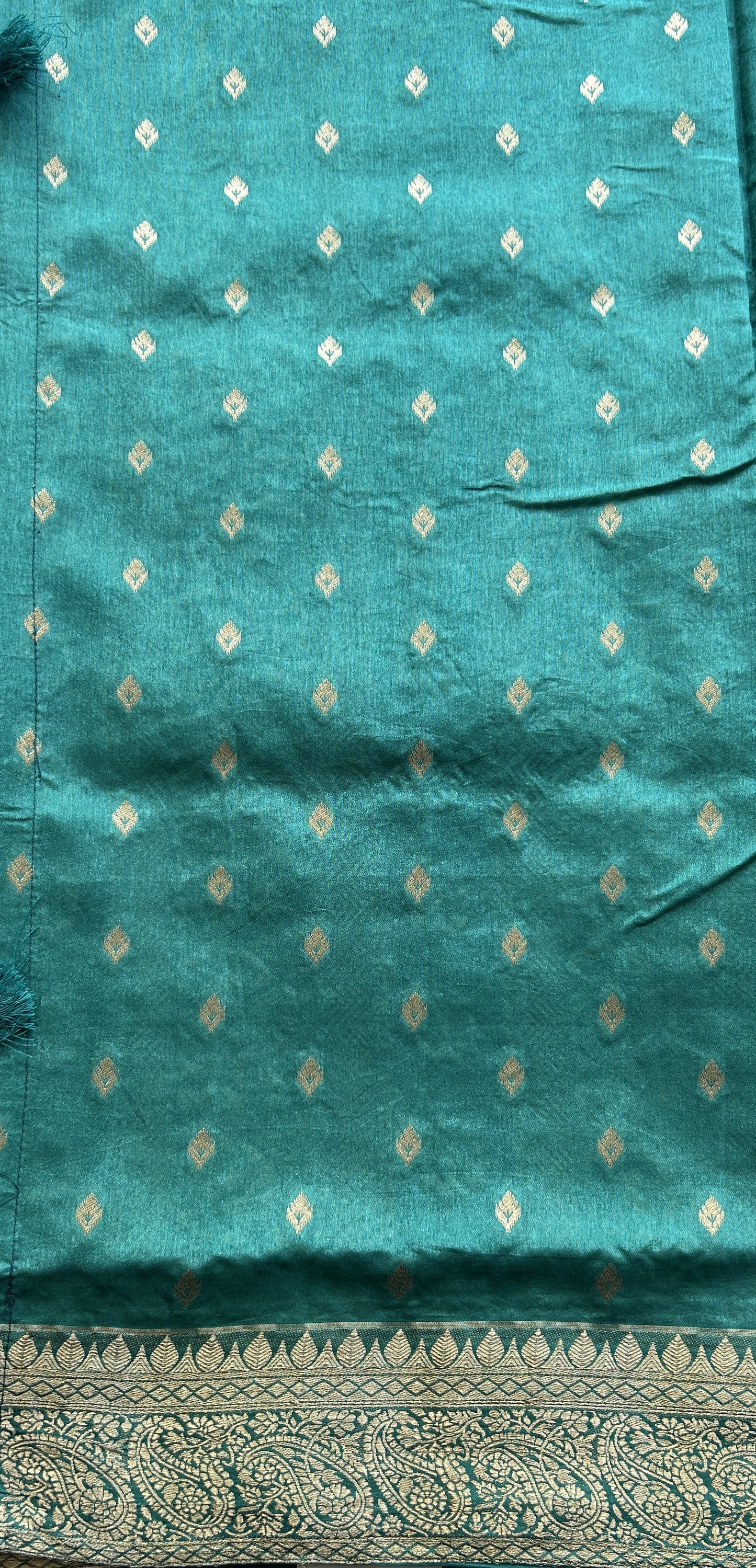 Semi Raw Silk Saree Bottle Green Colored Exquisite with a Zari Border. - Sampradaya Designer Studio