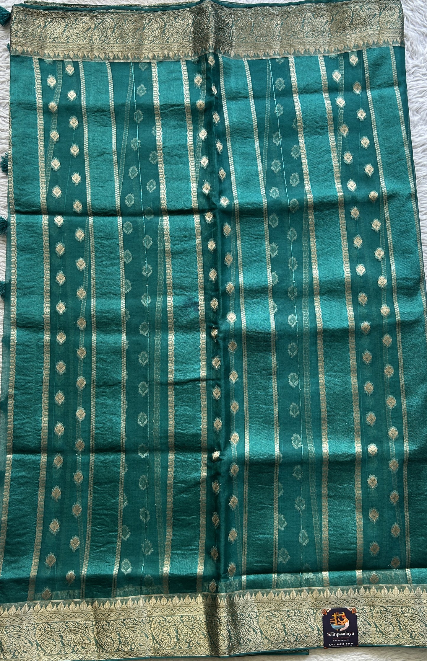 Semi Raw Silk Saree Bottle Green Colored Exquisite with a Zari Border. - Sampradaya Designer Studio