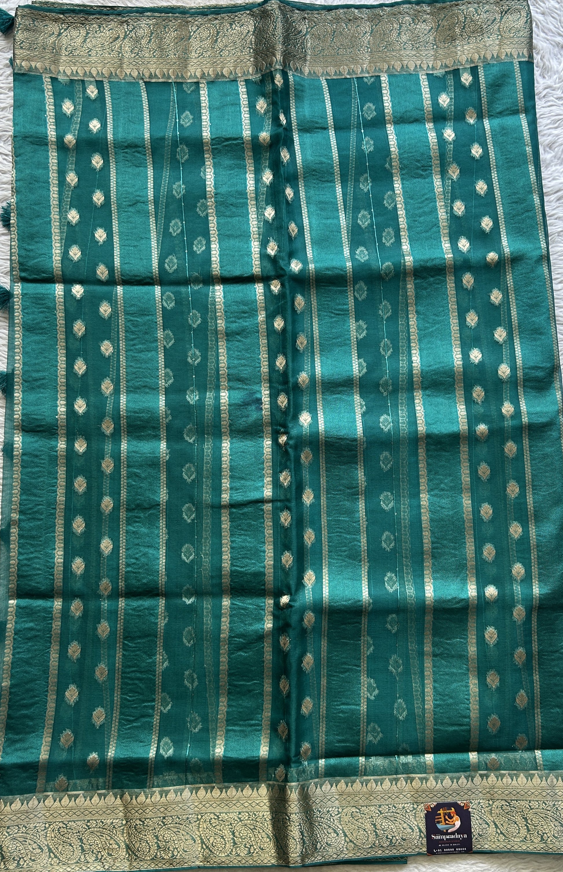 Semi Raw Silk Saree Bottle Green Colored Exquisite with a Zari Border. - Sampradaya Designer Studio