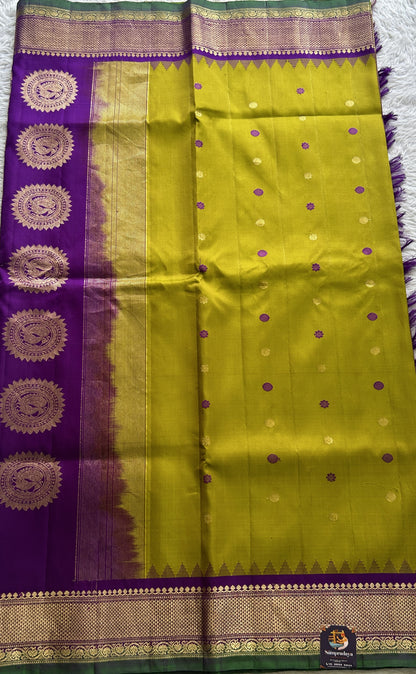 Gadwal Pattu Saree Mustard Yellow Colored Complemented With a Zari Border - Sampradaya Designer Studio