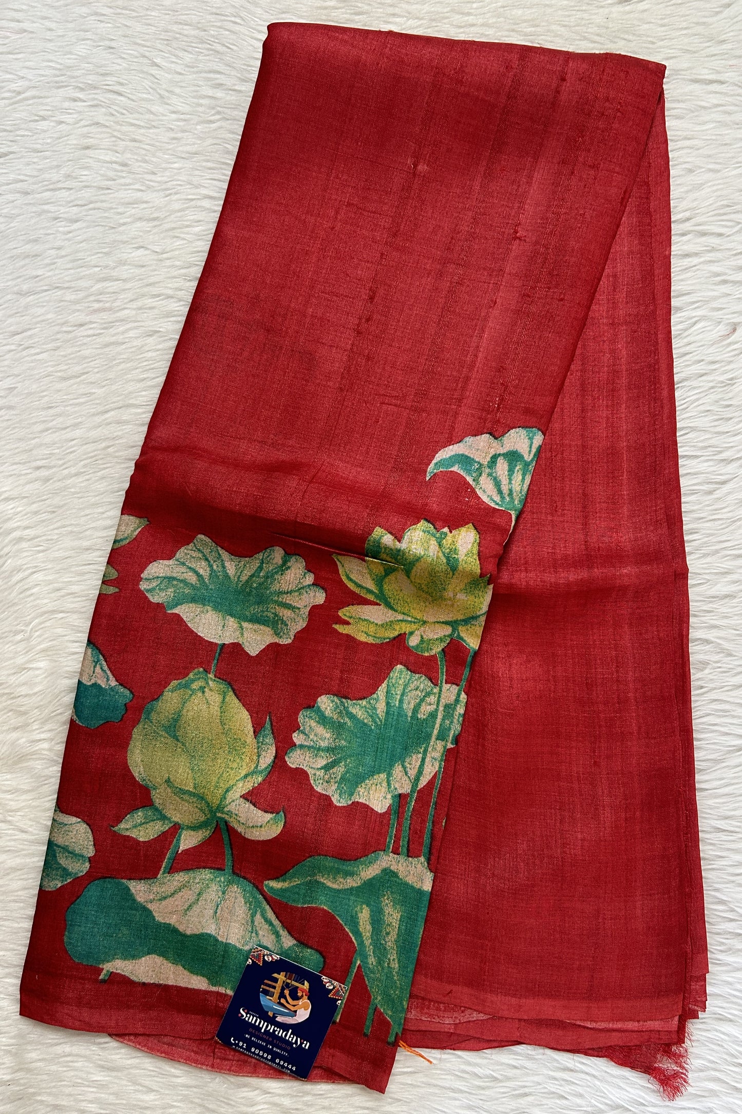 Tussar Silk Saree Red colored complemented with a borderless Saree. - Sampradaya Designer Studio