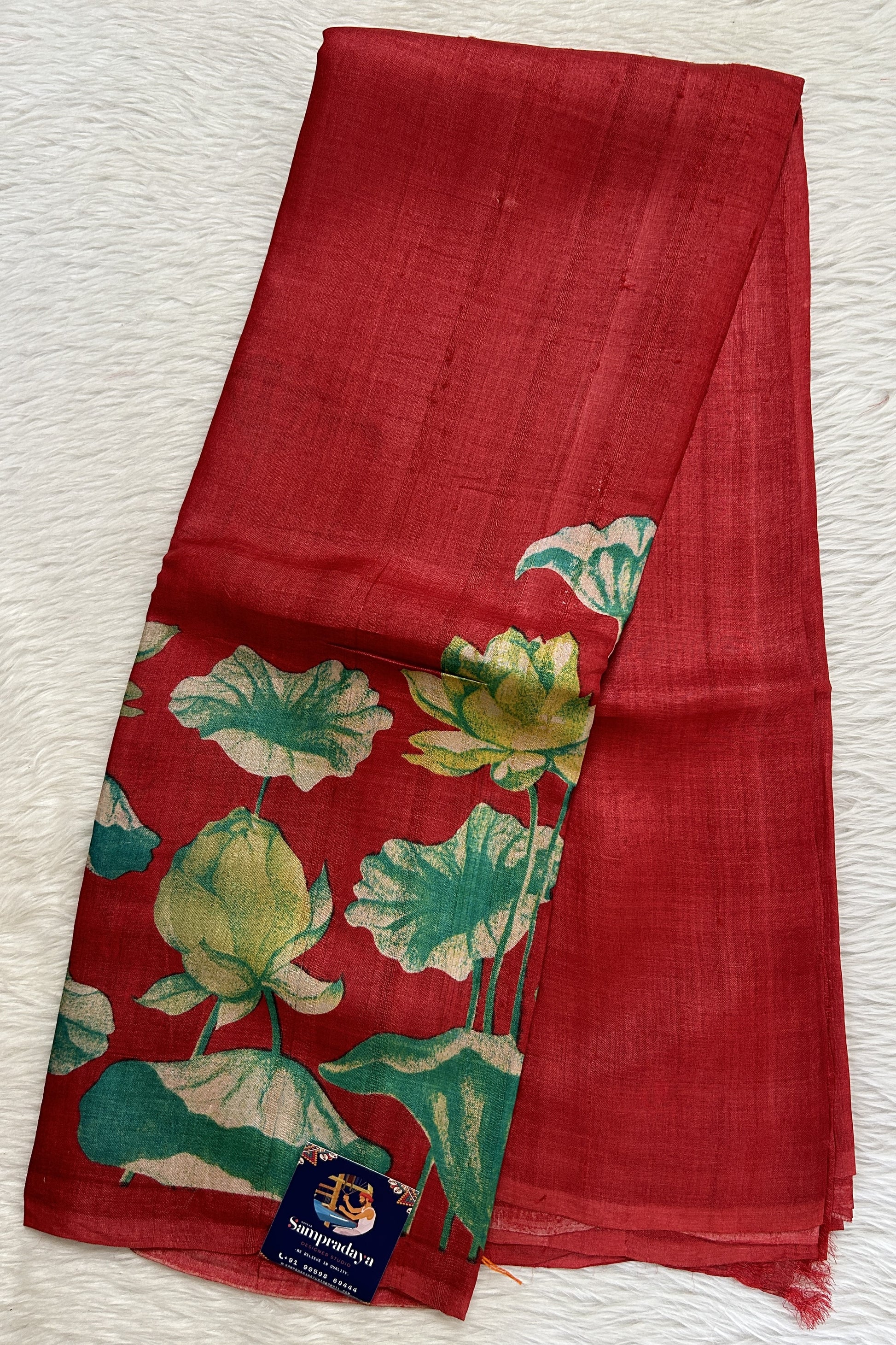 Tussar Silk Saree Red colored complemented with a borderless Saree. - Sampradaya Designer Studio