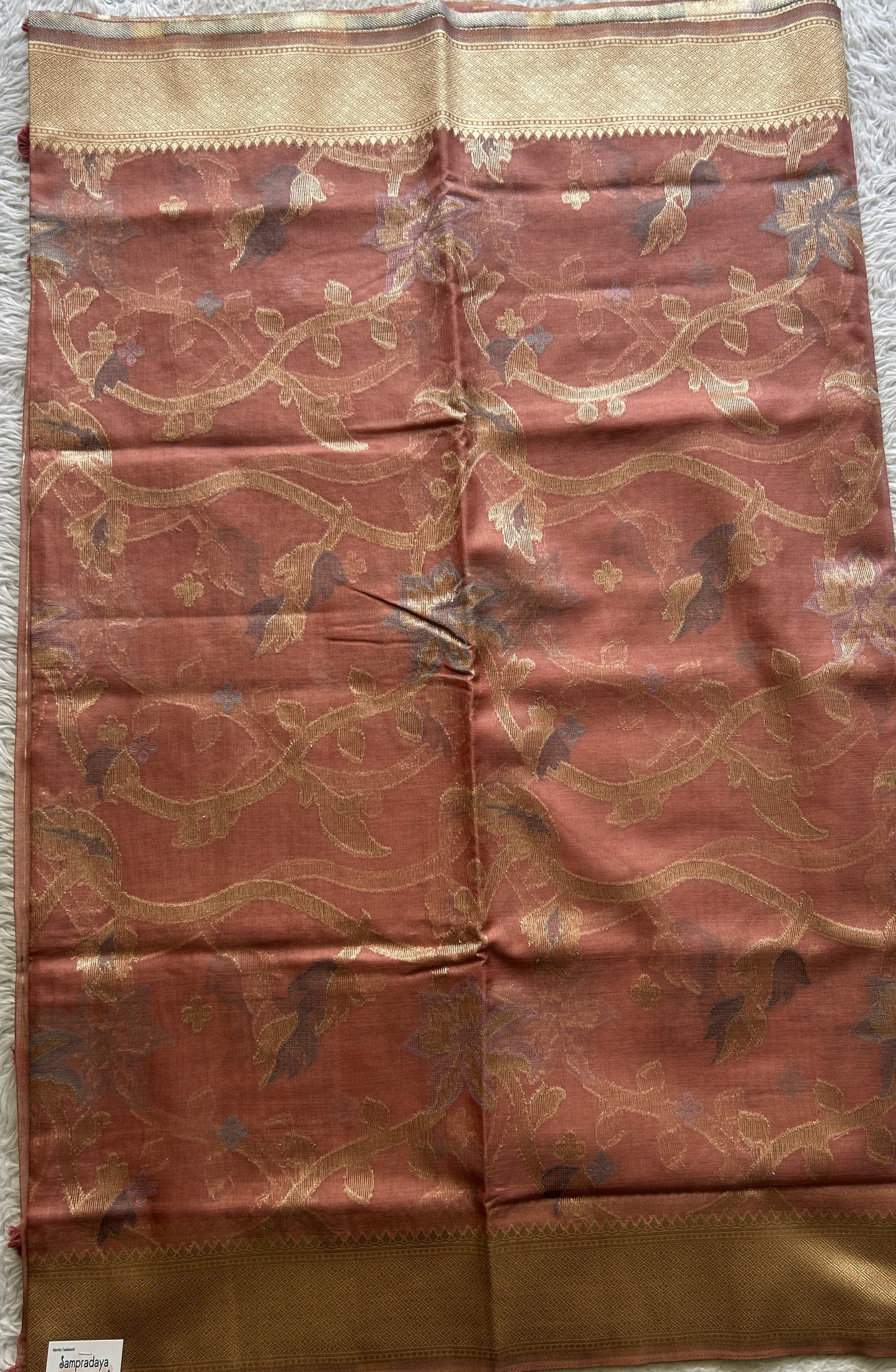 Semi Raw Silk Saree Peach Colored Exquisite with a Zari Border. - Sampradaya Designer Studio
