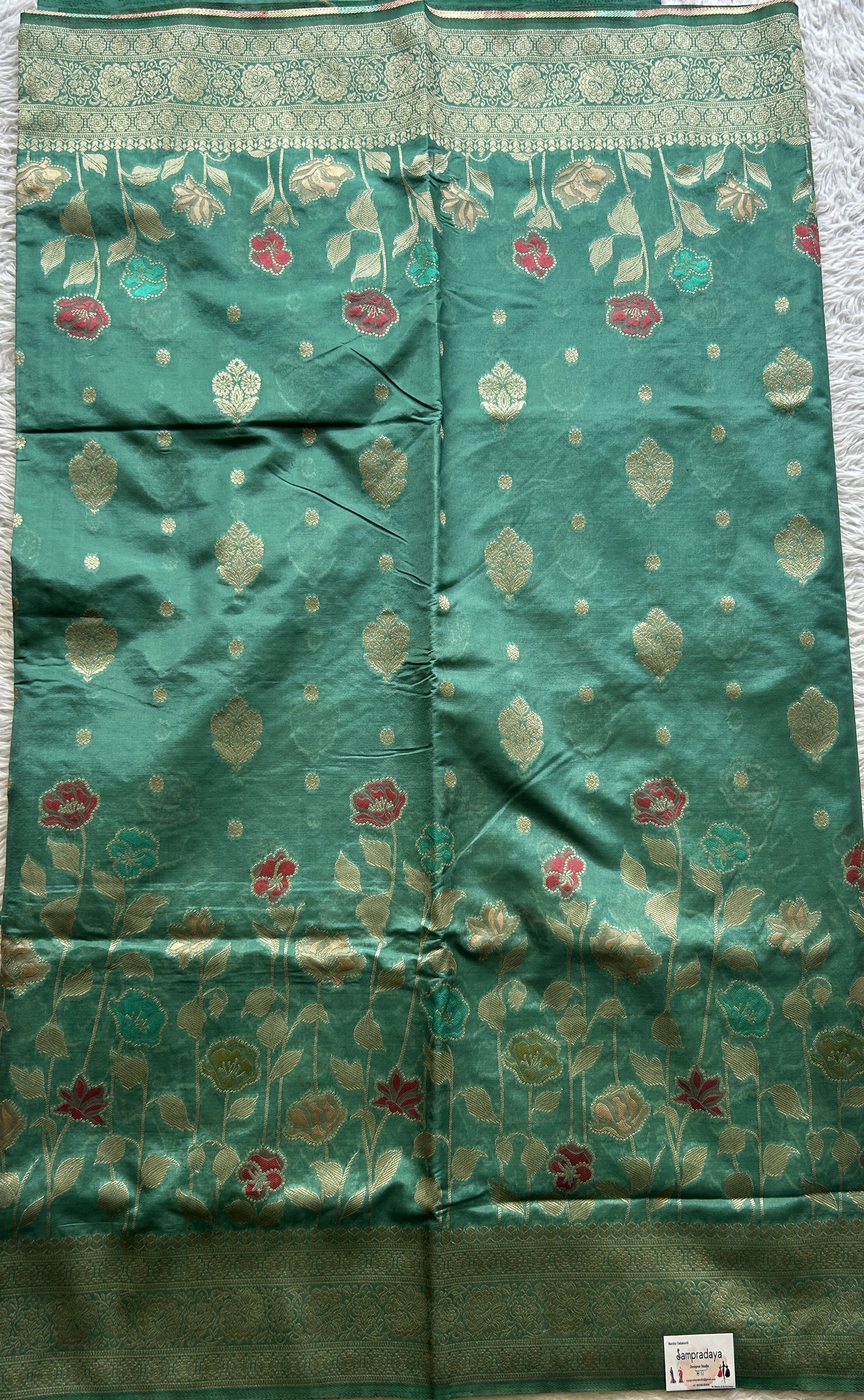 Semi Raw Silk Saree Rama Green Colored Exquisite with a Zari Border. - Sampradaya Designer Studio