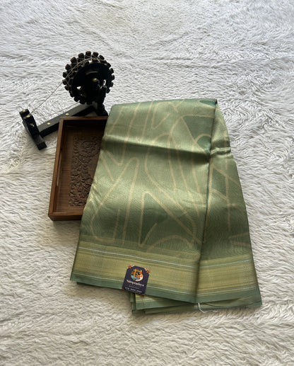 Tissue Organza Saree Light Sea Green Colored Elegantly Paired with a Zari Border. - Sampradaya Designer Studio