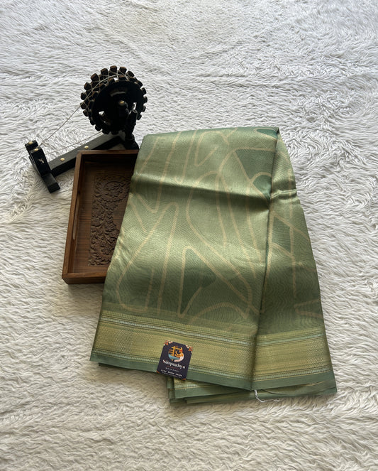 Tissue Organza Saree Light Sea Green Colored Elegantly Paired with a Zari Border. - Sampradaya Designer Studio