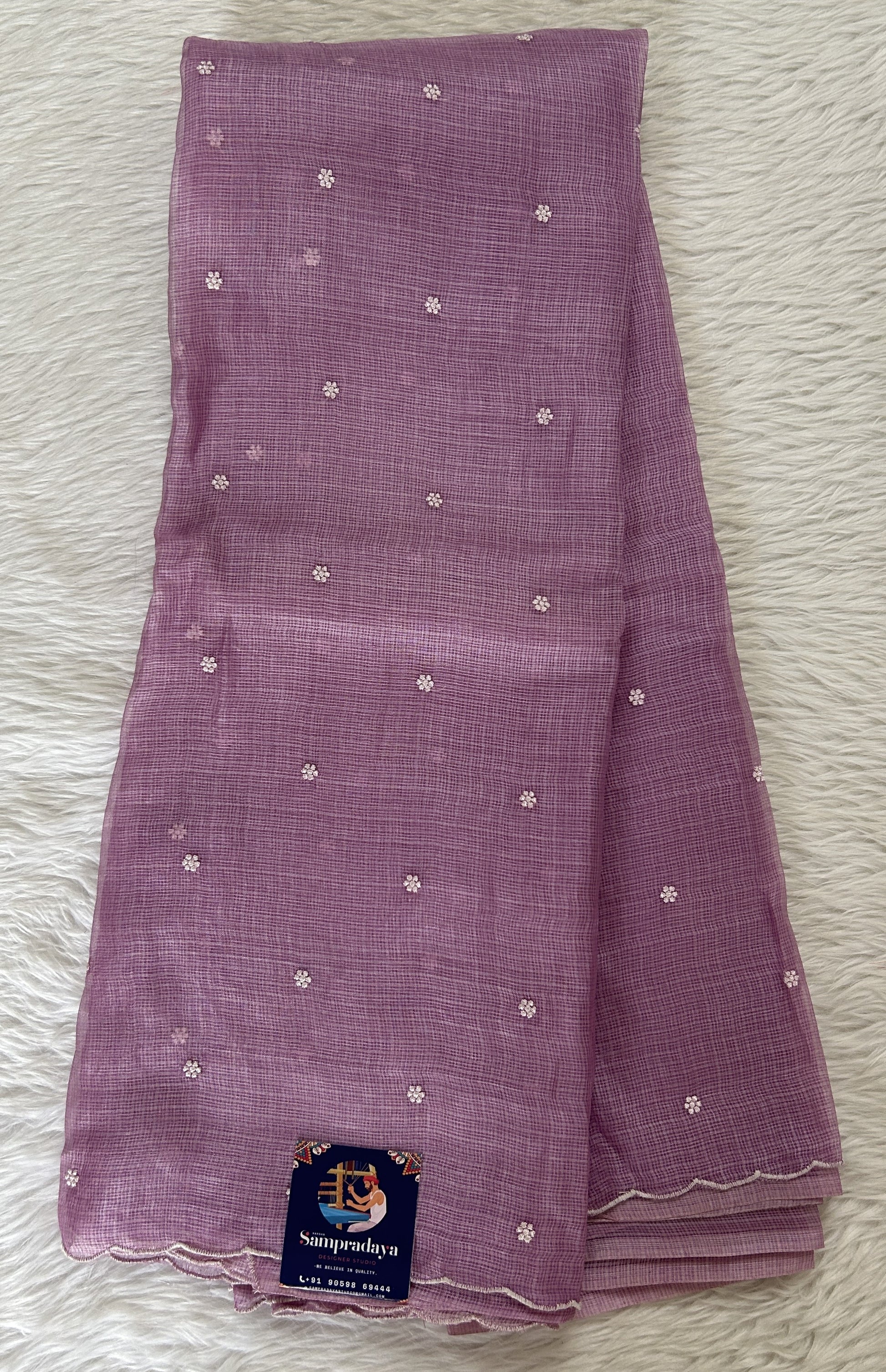 Tussar Silk Saree Lavender colored complemented with a borderless Saree. - Sampradaya Designer Studio