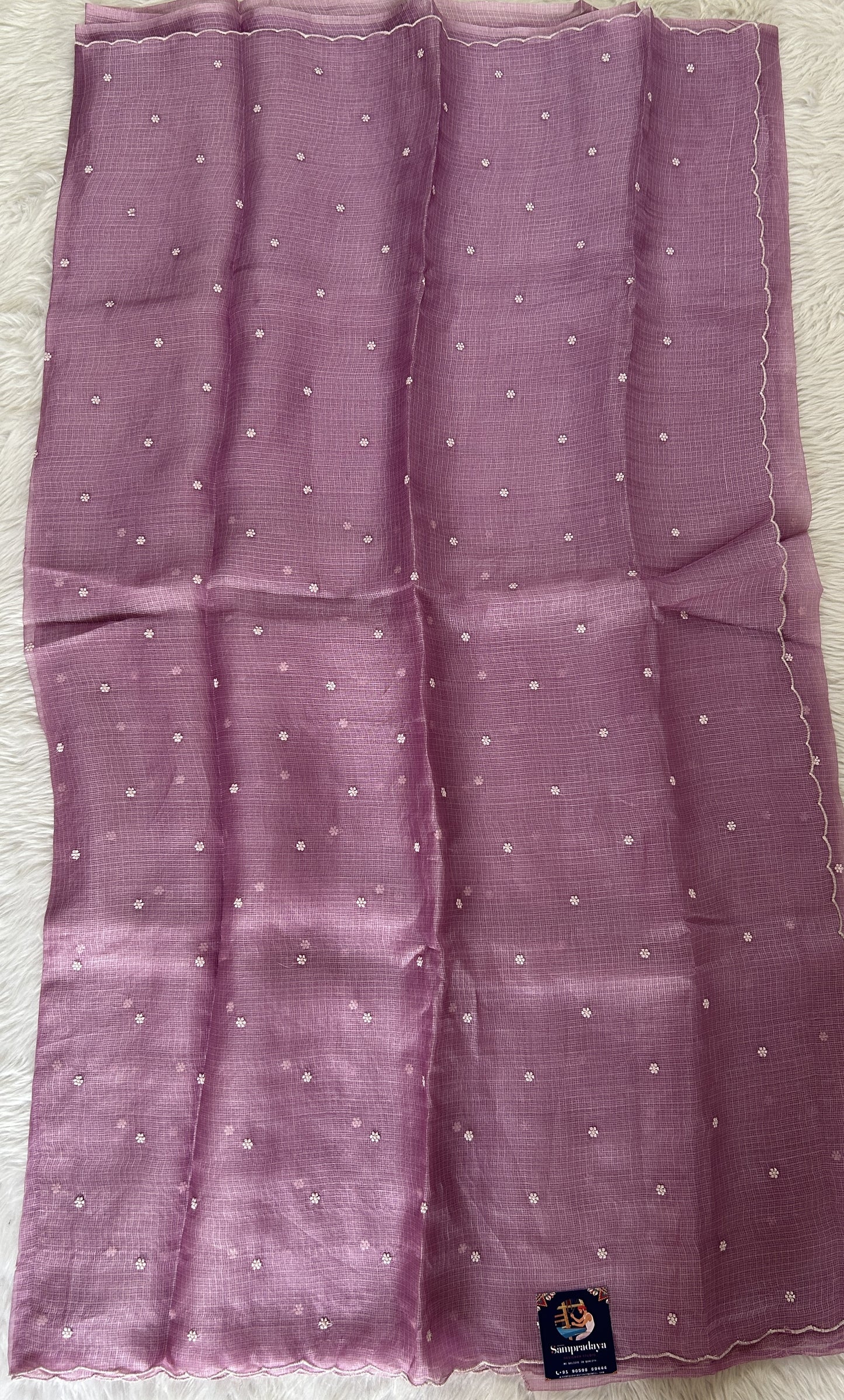 Tussar Silk Saree Lavender colored complemented with a borderless Saree. - Sampradaya Designer Studio