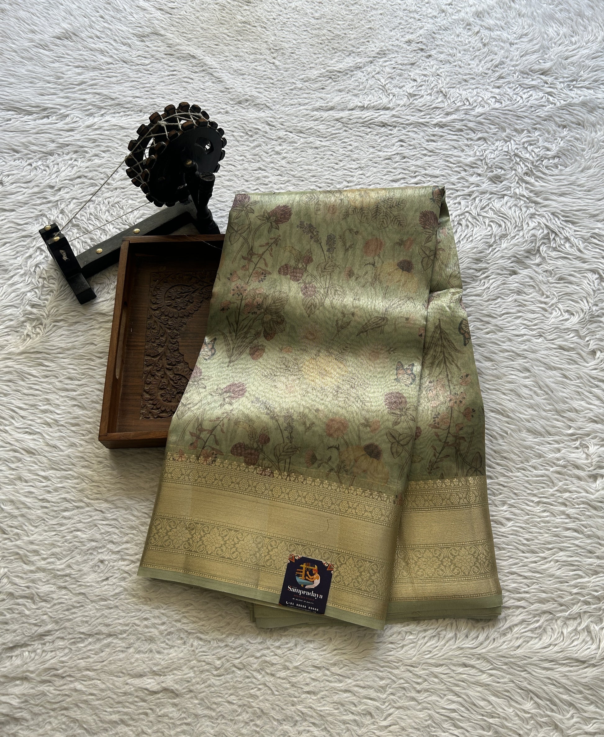 Tissue Organza Saree Light Green Colored Elegantly Paired with a Zari Border. - Sampradaya Designer Studio