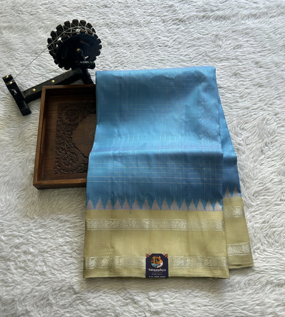 Gadwal Pattu Saree Sky Blue Colored Complemented With a Yellow Color Zari Gap Border - Sampradaya Designer Studio