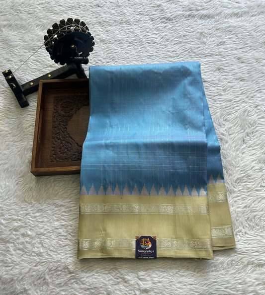 Gadwal Pattu Saree Sky Blue Colored Complemented With a Yellow Color Zari Gap Border - Sampradaya Designer Studio