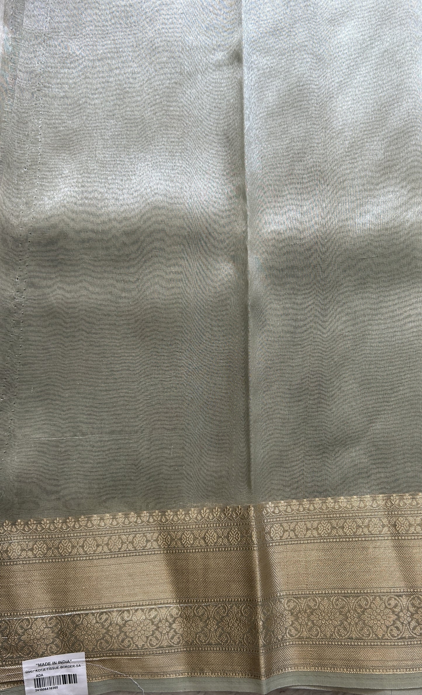 Tissue Organza Saree Light Green Colored Elegantly Paired with a Zari Border. - Sampradaya Designer Studio