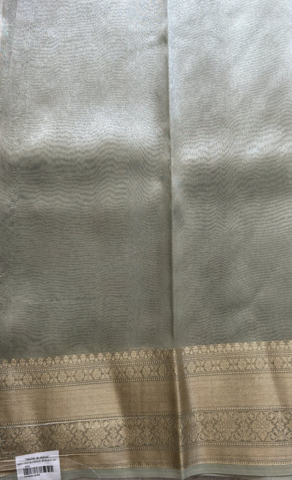 Tissue Organza Saree Light Green Colored Elegantly Paired with a Zari Border. - Sampradaya Designer Studio