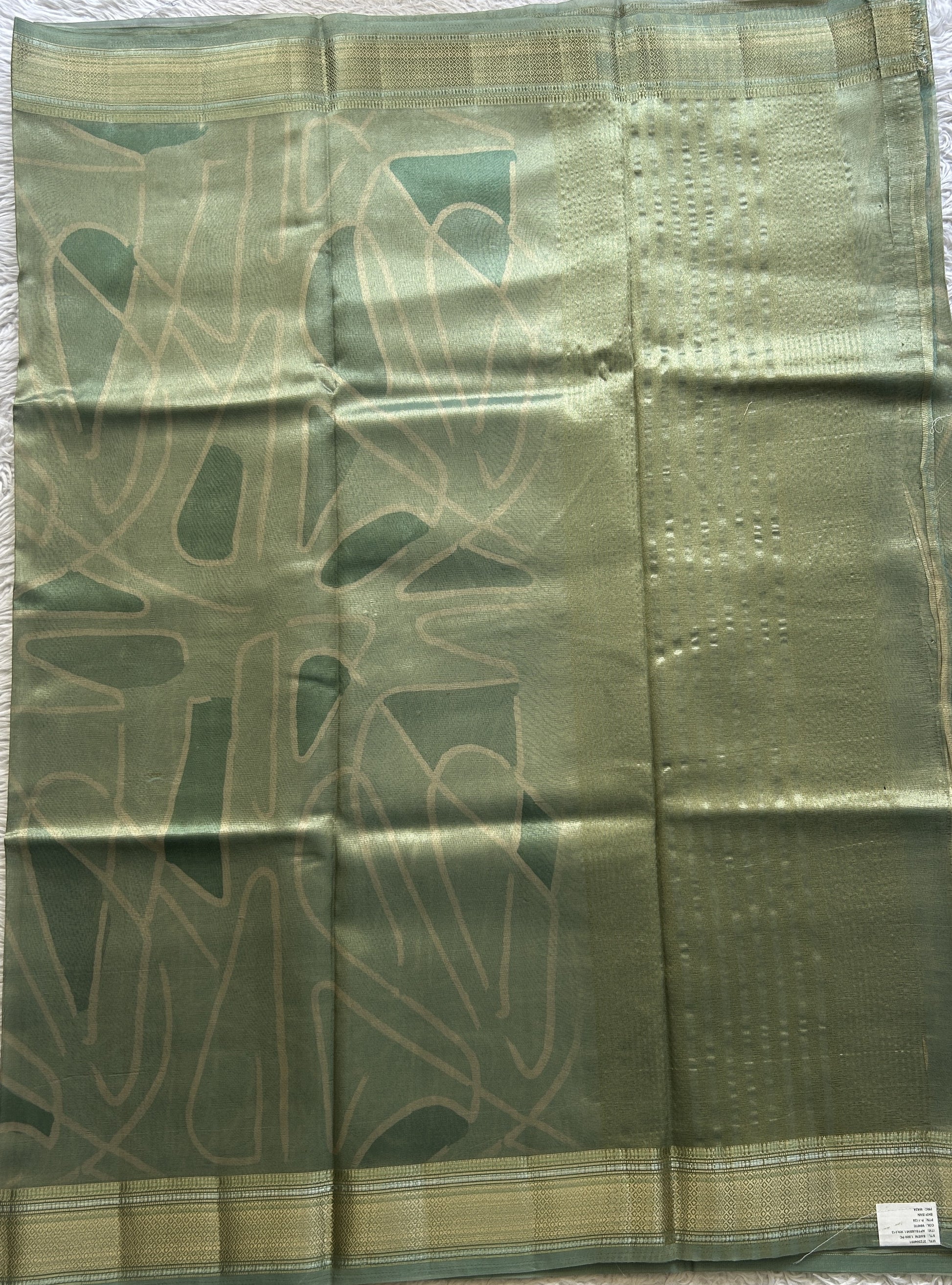 Tissue Organza Saree Light Sea Green Colored Elegantly Paired with a Zari Border. - Sampradaya Designer Studio