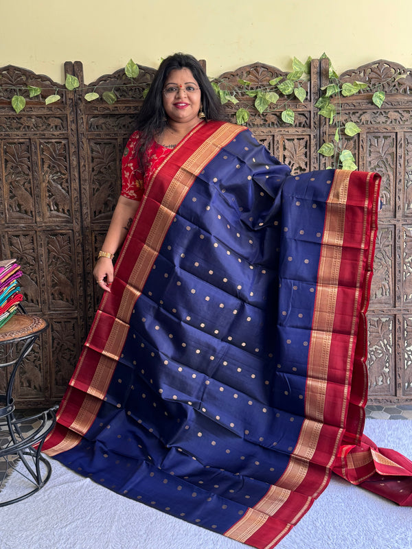 Pure Kanjivaram Silk Saree Inky Blue Colored Elegantly Paid with a Gold Zari Border - Sampradaya Designer Studio