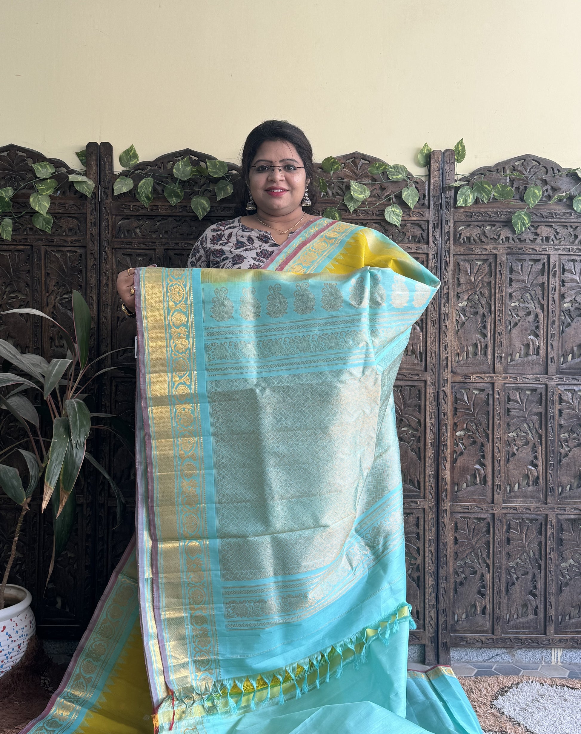 Gadwal Silk Saree Yellow Colored Complemented With a Kanchi Border - Sampradaya Designer Studio