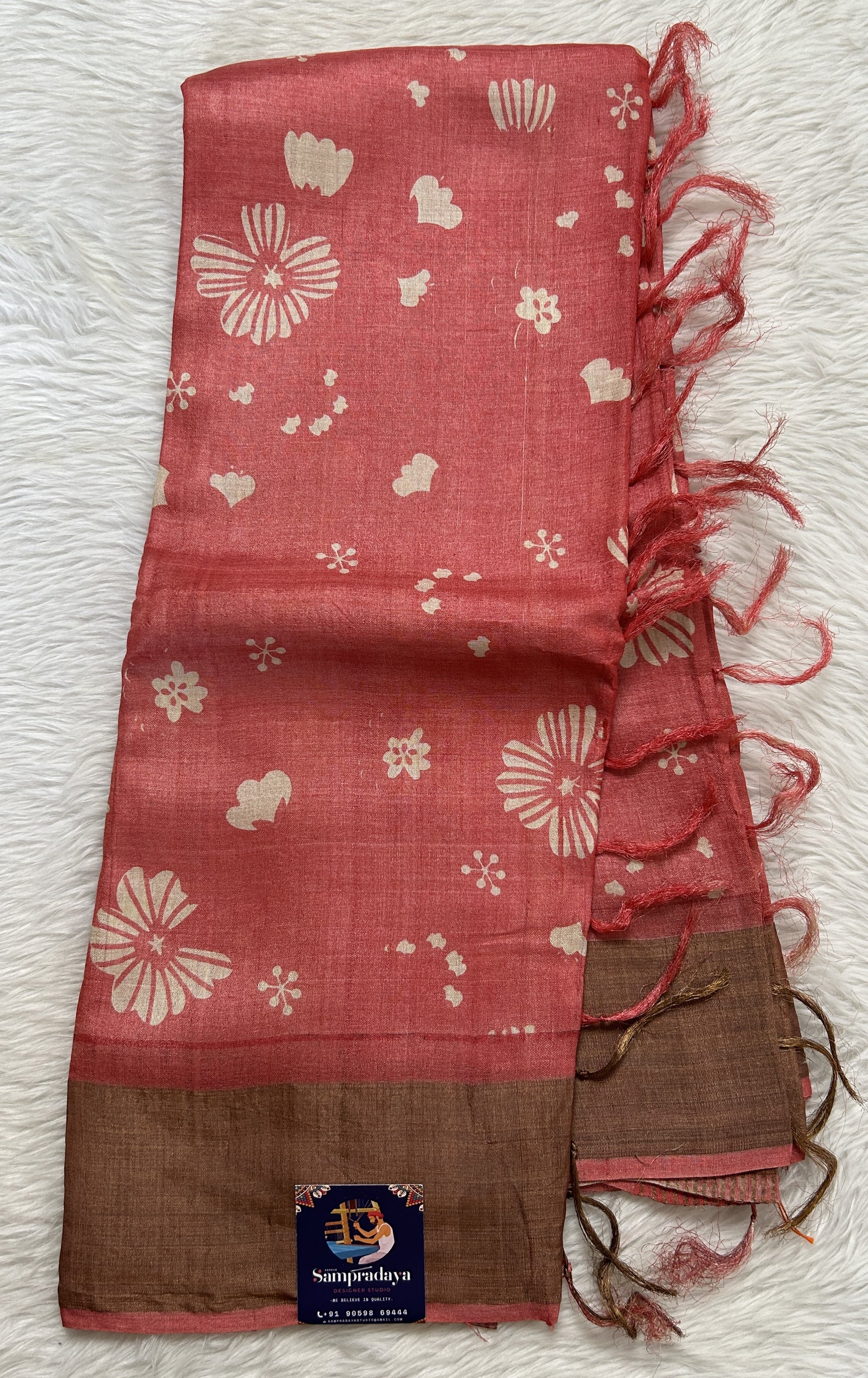 Tussar Silk Saree Peach colored saree complemented with a Copper Zari border. - Sampradaya Designer Studio