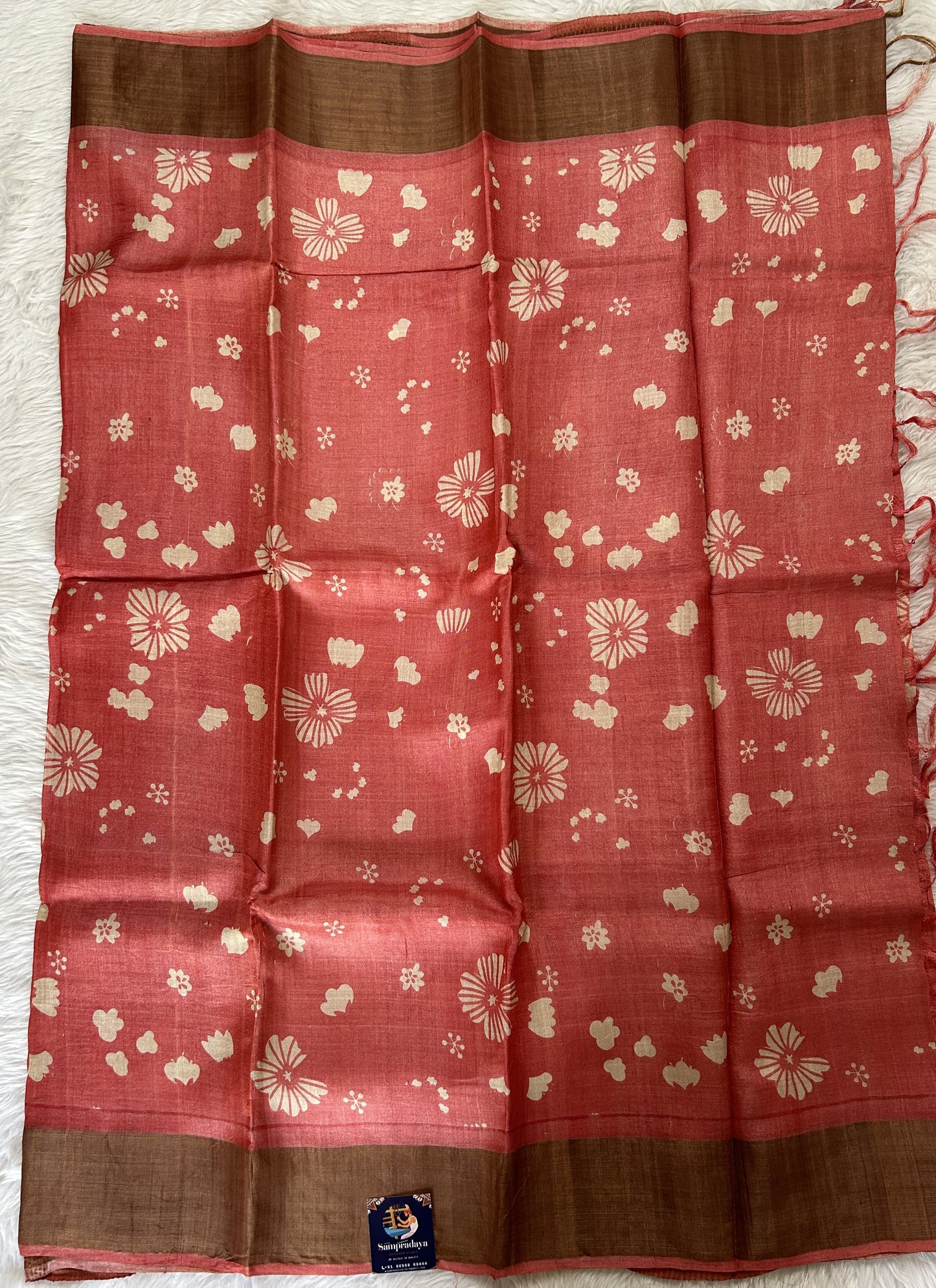 Tussar Silk Saree Peach colored saree complemented with a Copper Zari border. - Sampradaya Designer Studio