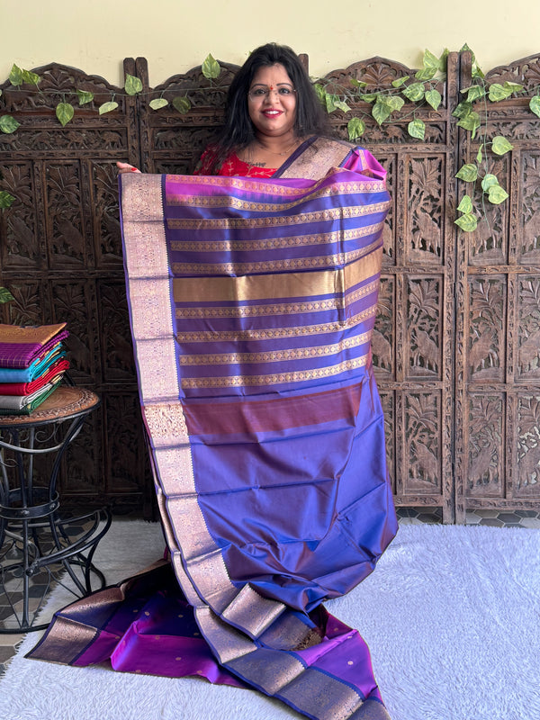 Pure Kanjivaram Silk Saree Light Electric Violet Colored Elegantly Paid with a Gold Zari Border - Sampradaya Designer Studio