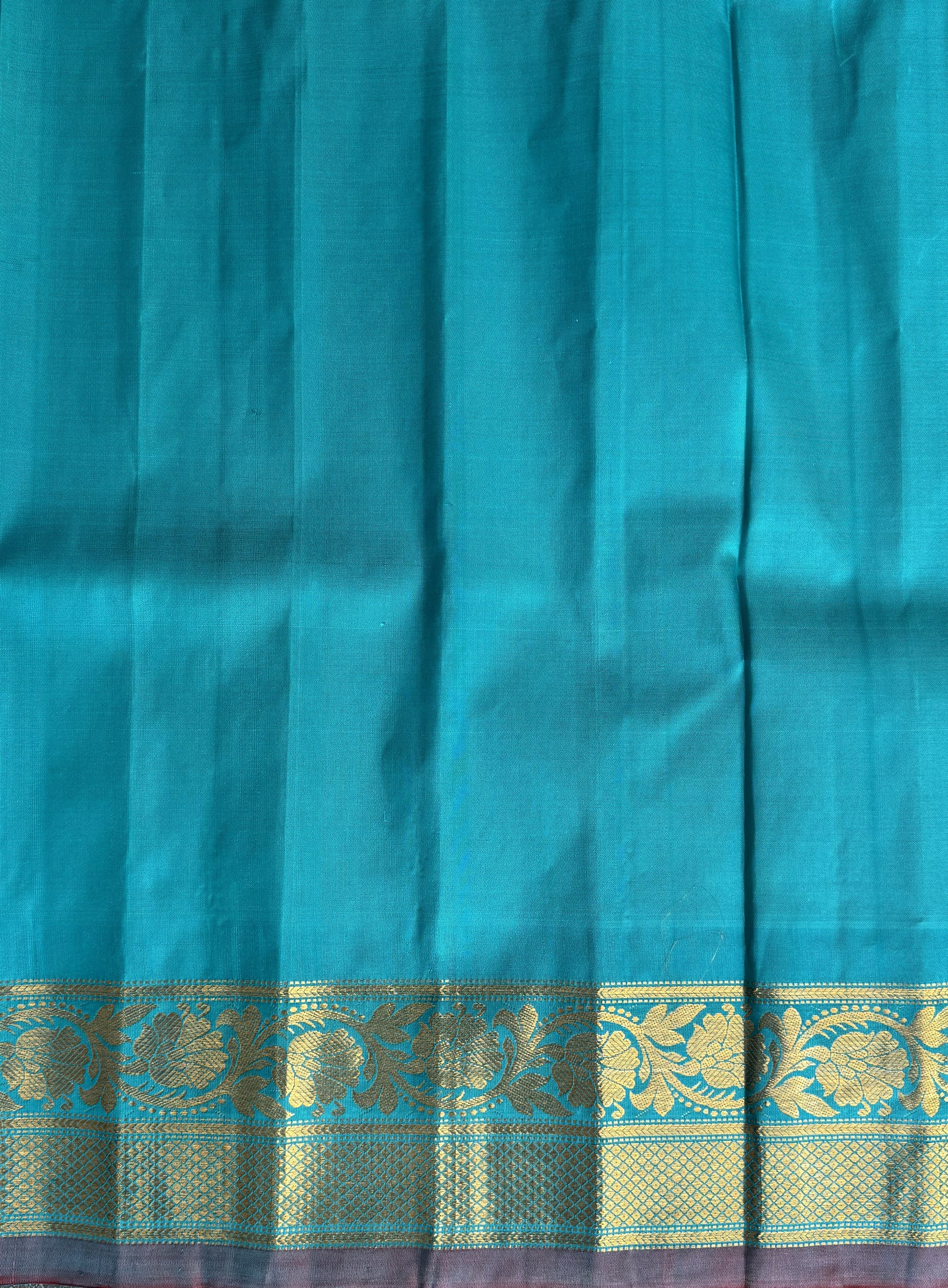 Gadwal Silk Saree Cream Colored Complemented With a Sea Blue Kanchi Border - Sampradaya Designer Studio
