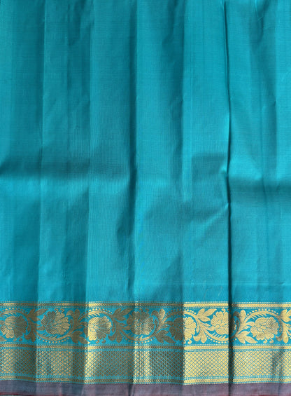 Gadwal Silk Saree Cream Colored Complemented With a Sea Blue Kanchi Border - Sampradaya Designer Studio