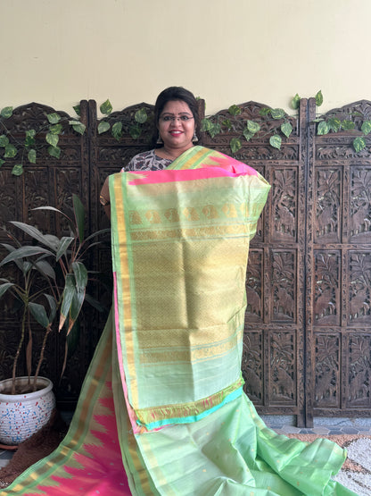 Gadwal Silk Saree Pink Colored Complemented With a Sea Green Crown Border - Sampradaya Designer Studio