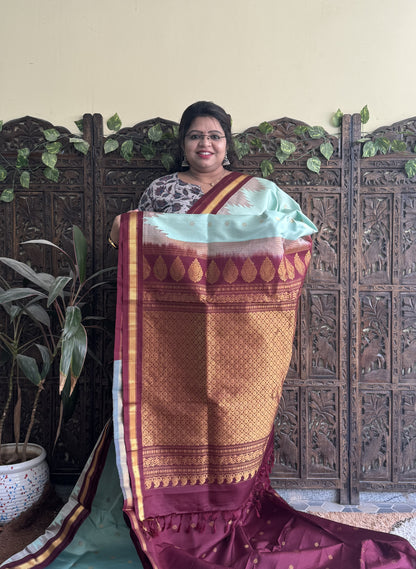 Gadwal Silk Saree Sea Green Colored Complemented With a Brown Zari Border - Sampradaya Designer Studio