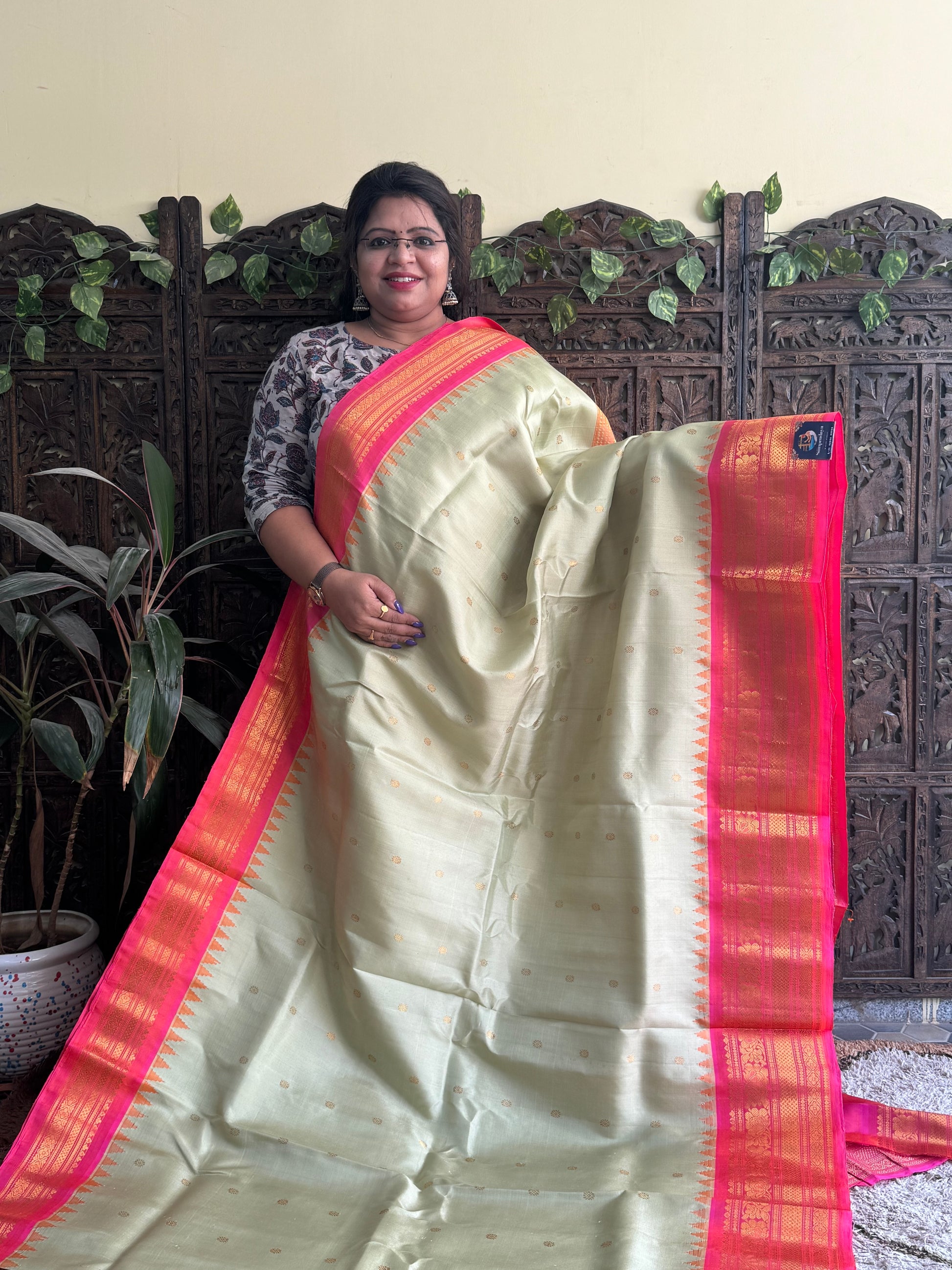 Gadwal Silk Saree Cream Colored Complemented With a Pink Zari Border - Sampradaya Designer Studio