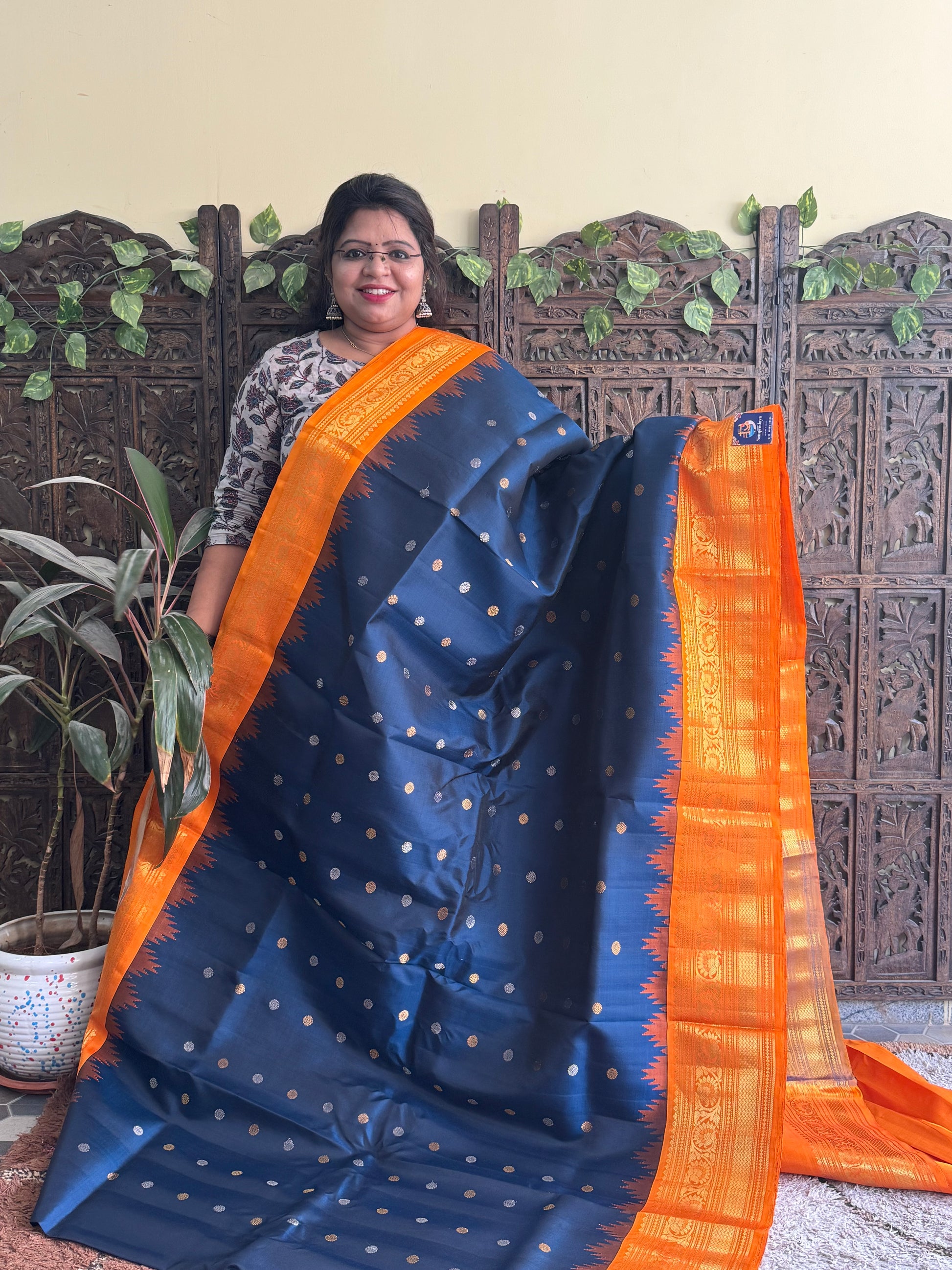 Gadwal Silk Saree Teal Blue Colored Complemented With a Orange Zari Border - Sampradaya Designer Studio