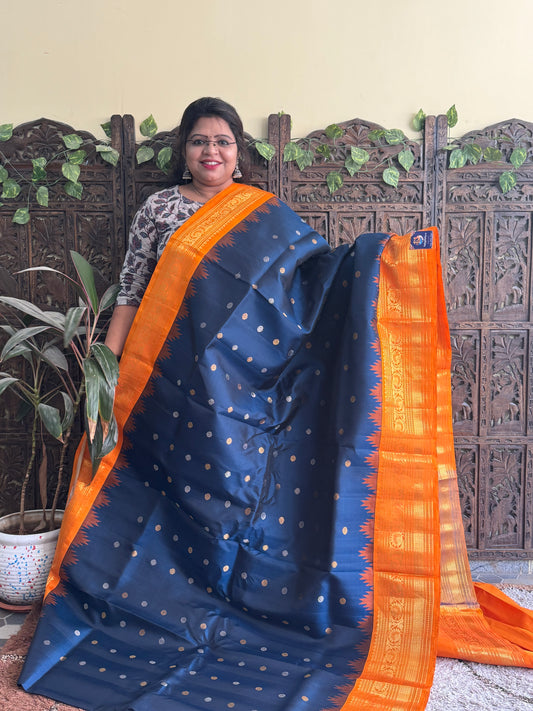 Gadwal Silk Saree Teal Blue Colored Complemented With a Orange Zari Border - Sampradaya Designer Studio