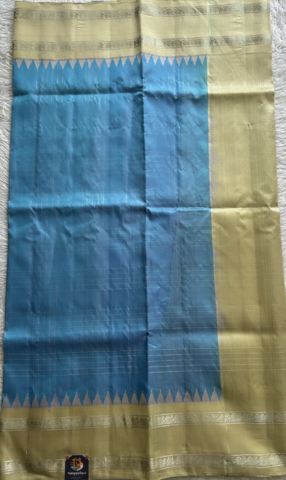 Gadwal Pattu Saree Sky Blue Colored Complemented With a Yellow Color Zari Gap Border - Sampradaya Designer Studio