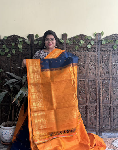 Gadwal Silk Saree Teal Blue Colored Complemented With a Orange Zari Border - Sampradaya Designer Studio