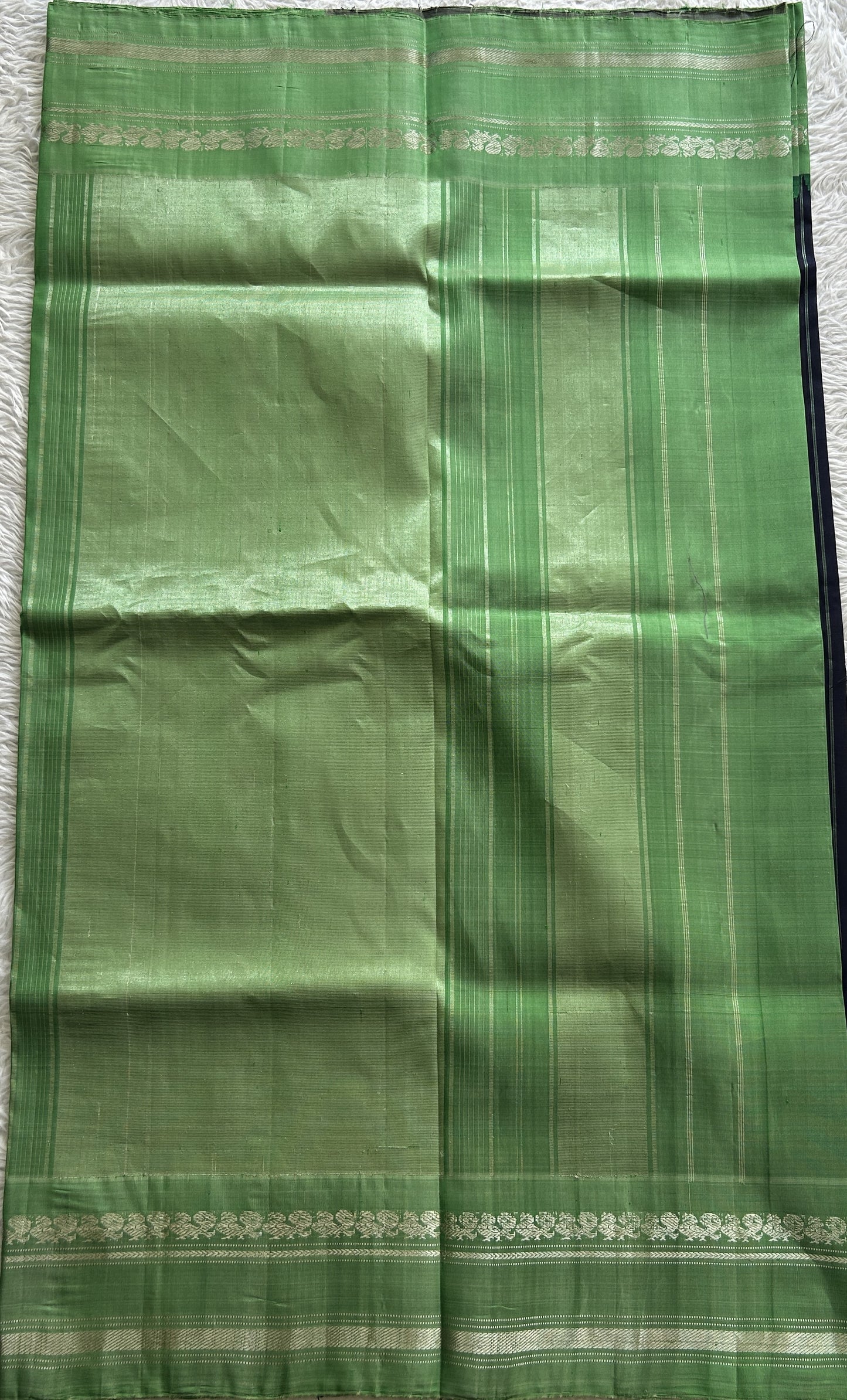 Gadwal Pattu Saree Navy Blue Colored Complemented With a Green Color Zari Gap Border - Sampradaya Designer Studio