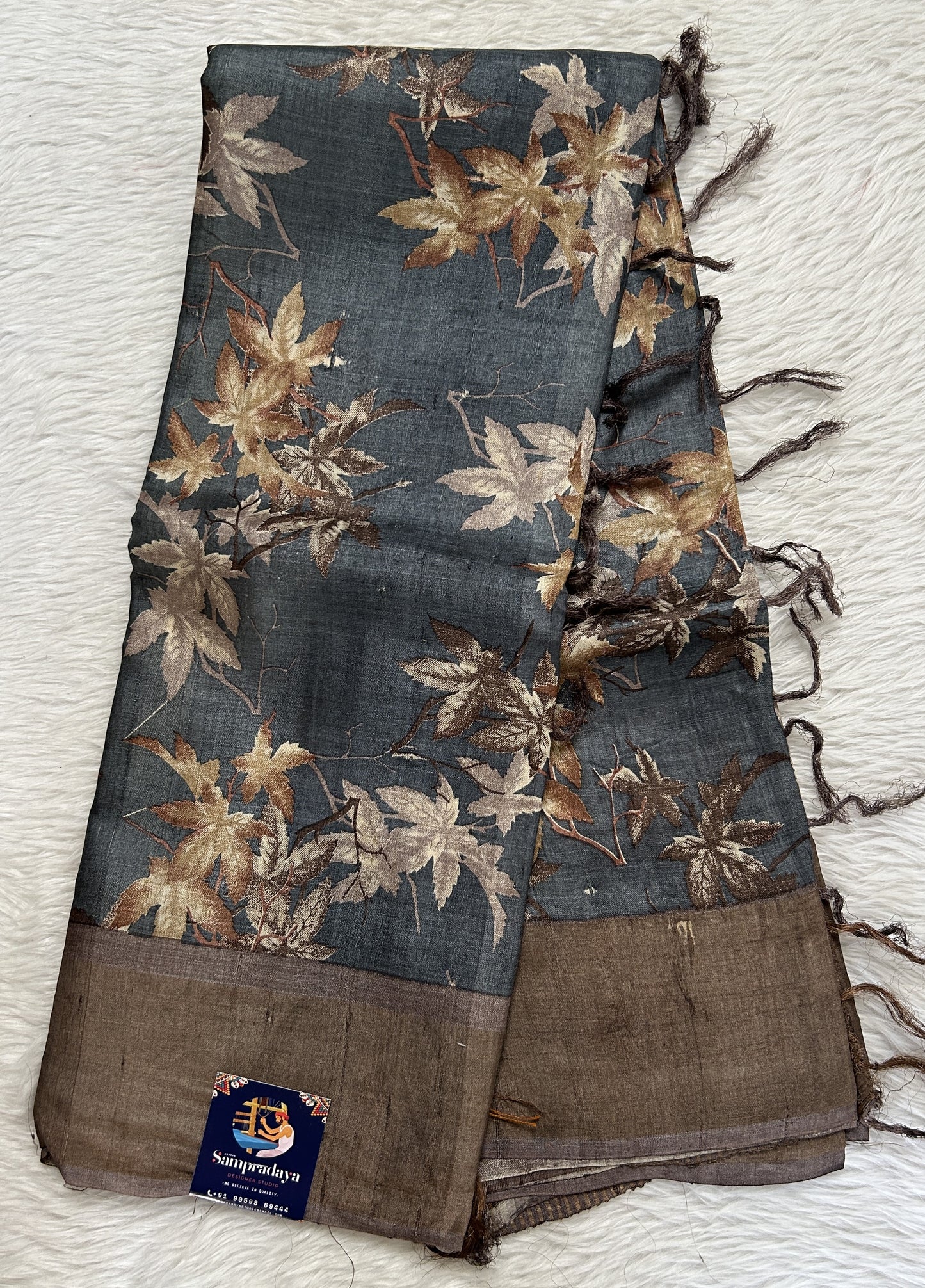 Tussar Silk Saree Gray colored saree complemented with a Copper Zari border. - Sampradaya Designer Studio