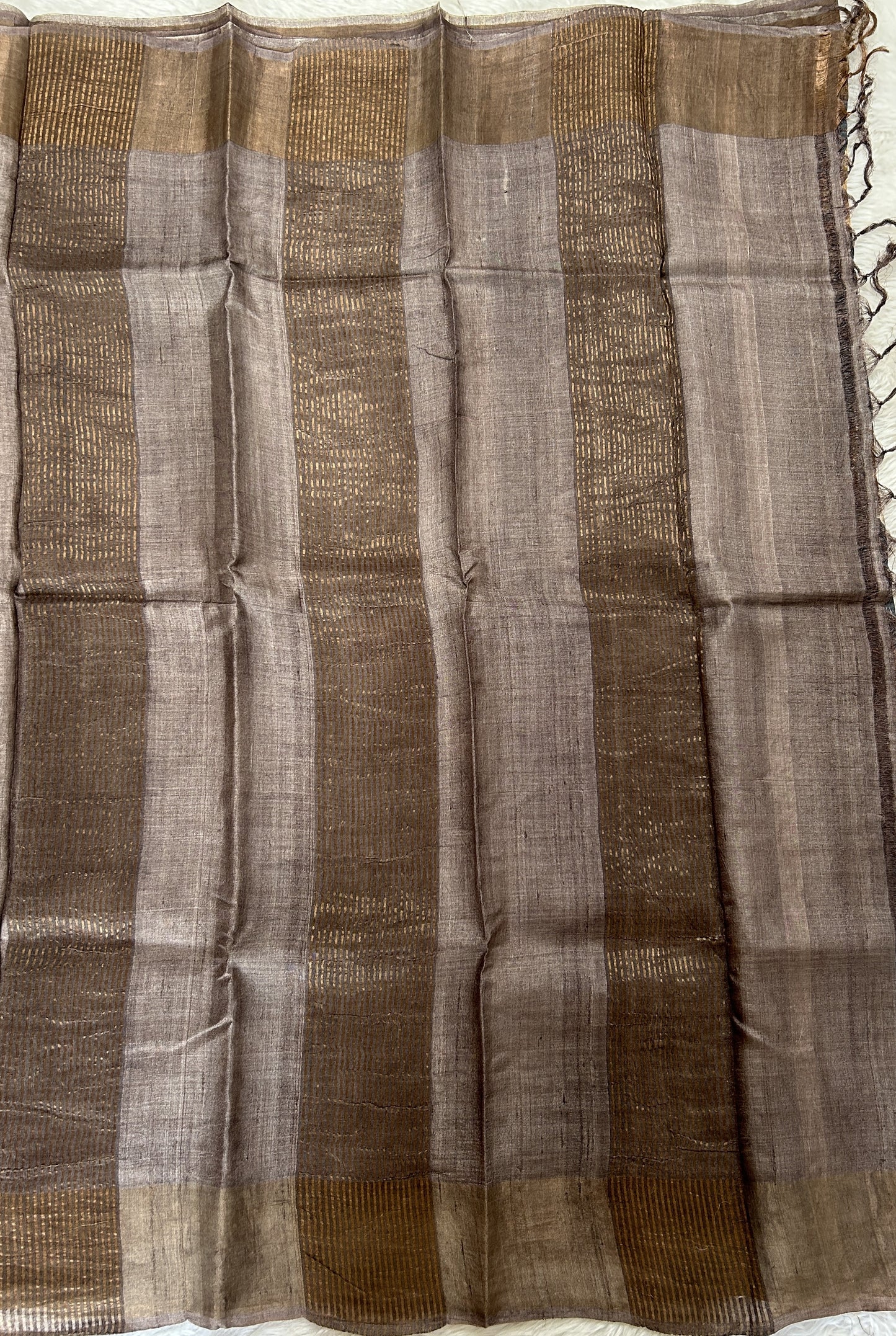 Tussar Silk Saree Gray colored saree complemented with a Copper Zari border. - Sampradaya Designer Studio