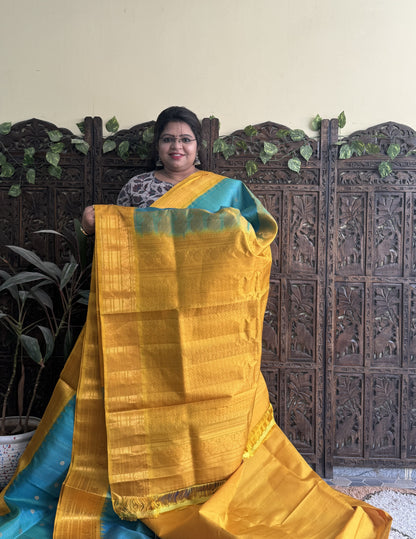 Gadwal Silk Saree Fern Colored Complemented With a Yellow Zari Border - Sampradaya Designer Studio