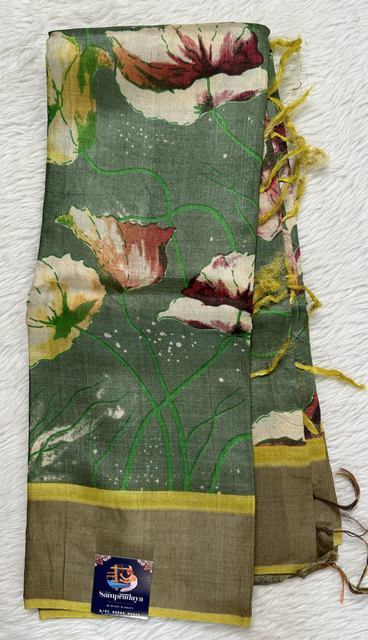 Tussar Silk Saree Green colored complemented with a Yellow Colored Zari border. - Sampradaya Designer Studio