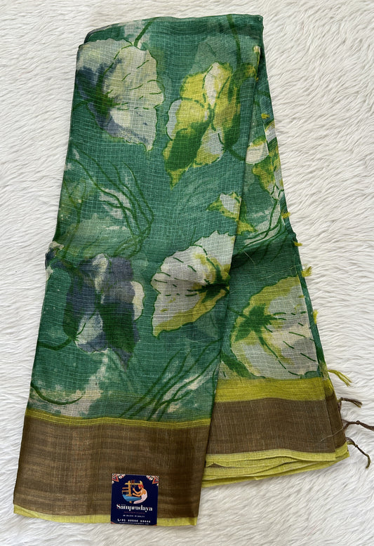 Tussar Silk Saree Green colored complemented with a Lemon Yellow Colored Zari border. - Sampradaya Designer Studio