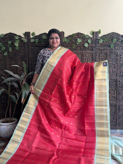 Gadwal Silk Saree Red Colored Complemented With a Sea Green Zari Border - Sampradaya Designer Studio