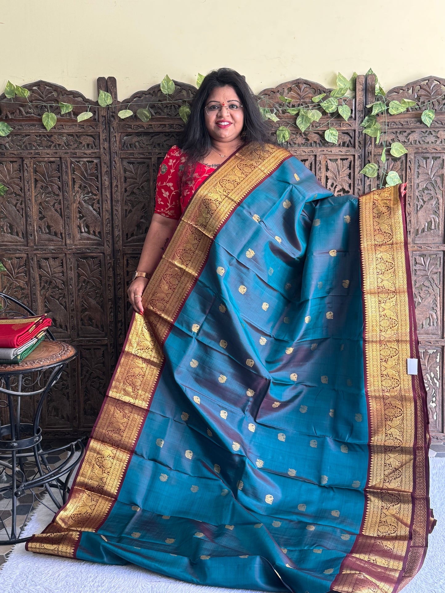 Pure Kanjivaram Silk Saree Peacock Blue Colored Elegantly Paid with a Gold Zari Border