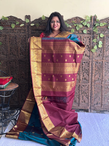 Pure Kanjivaram Silk Saree Peacock Blue Colored Elegantly Paid with a Gold Zari Border