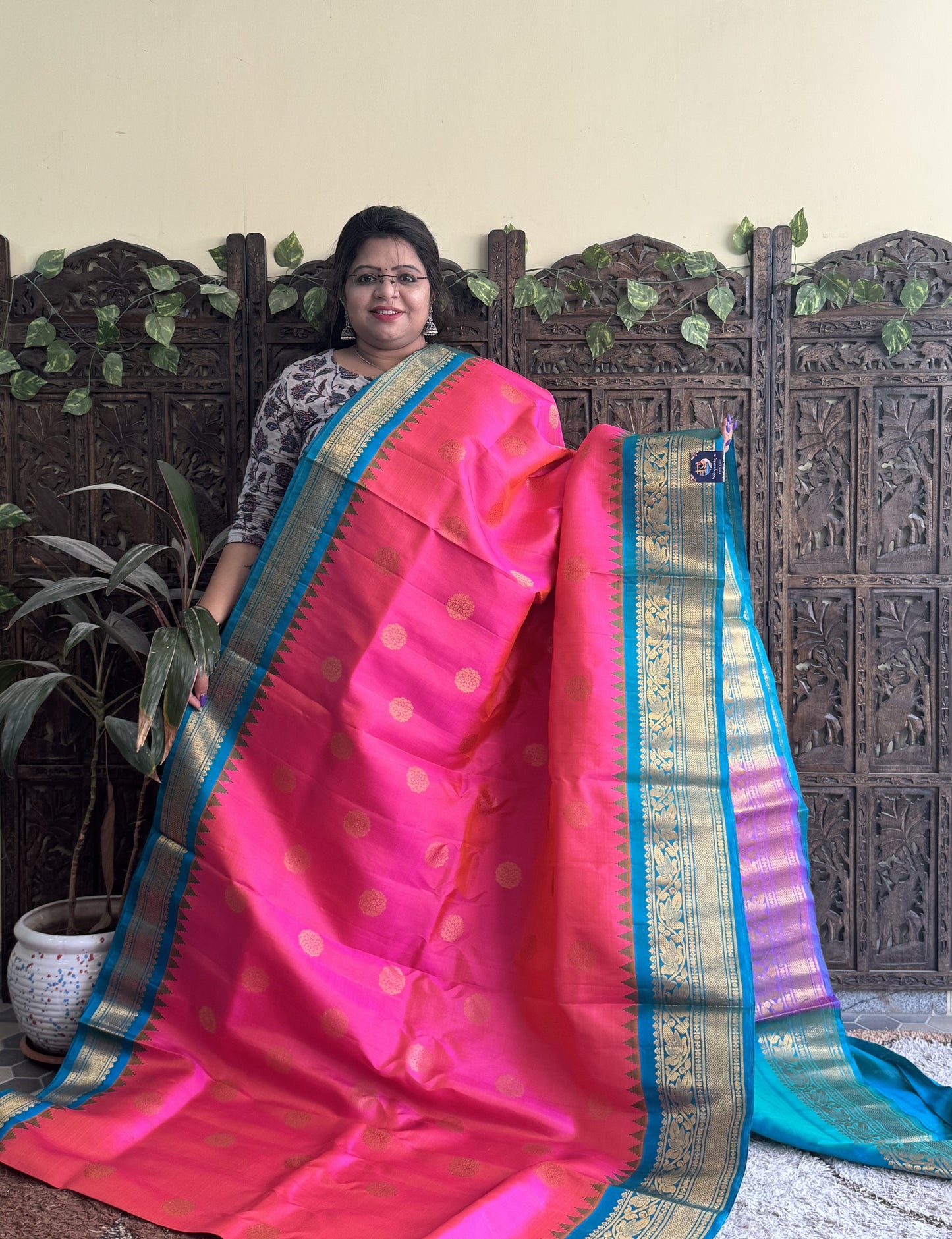Gadwal Silk Saree Pink Colored Complemented With a Turquoise Blue Zari Border - Sampradaya Designer Studio