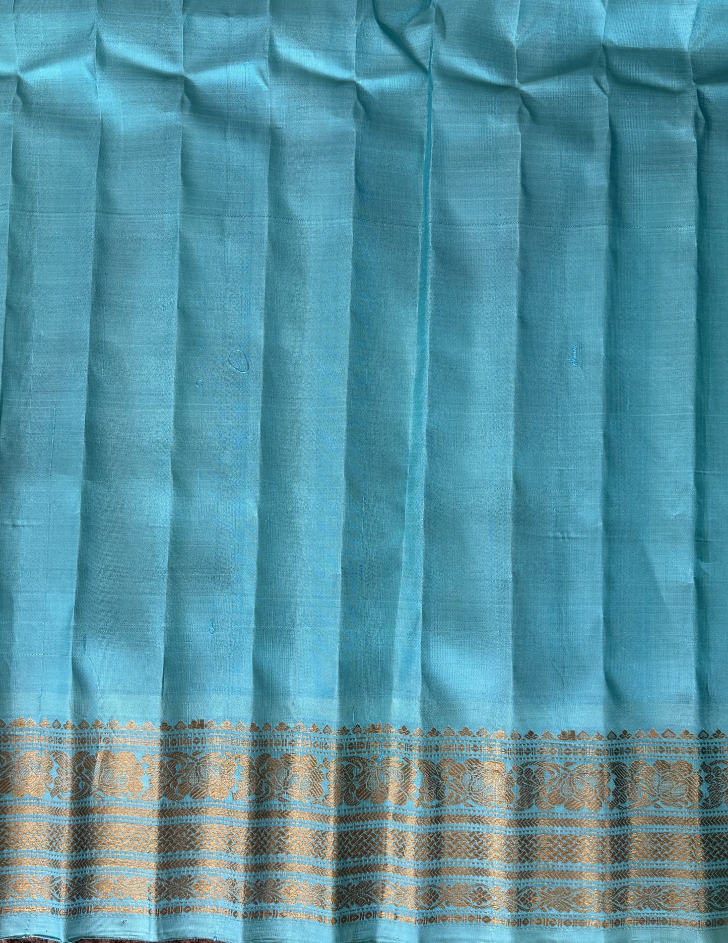 Gadwal Silk Saree Violet Colored Complemented With a Sea Blue Zari Border - Sampradaya Designer Studio