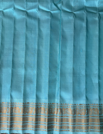 Gadwal Silk Saree Violet Colored Complemented With a Sea Blue Zari Border - Sampradaya Designer Studio