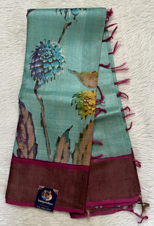 Tussar Silk Saree Sea Blue colored complemented with a Pink Colored Gold Zari border. - Sampradaya Designer Studio