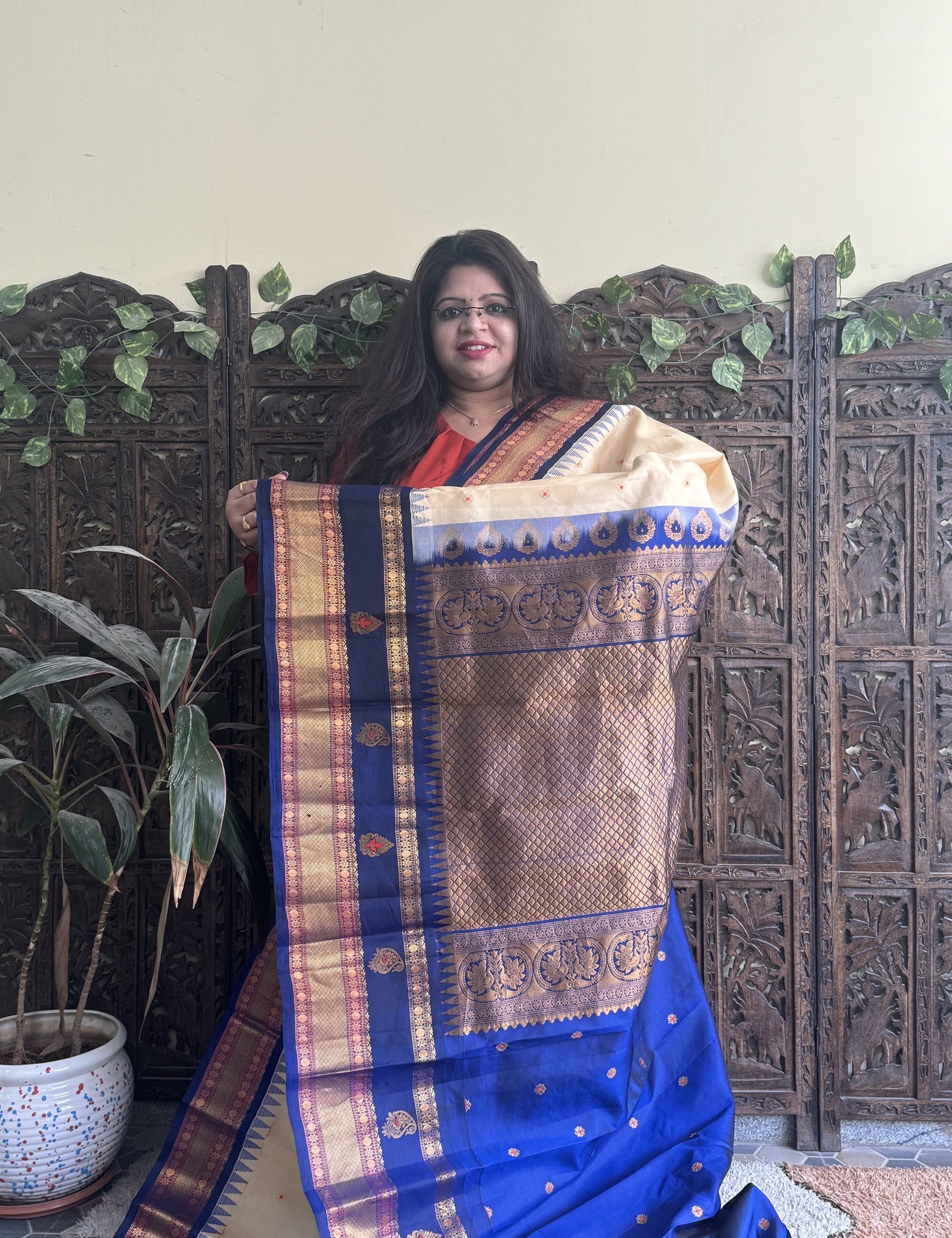 Gadwal Pattu Saree Cream colored saree complemented with a Ink Blue Zari border - Sampradaya Designer Studio
