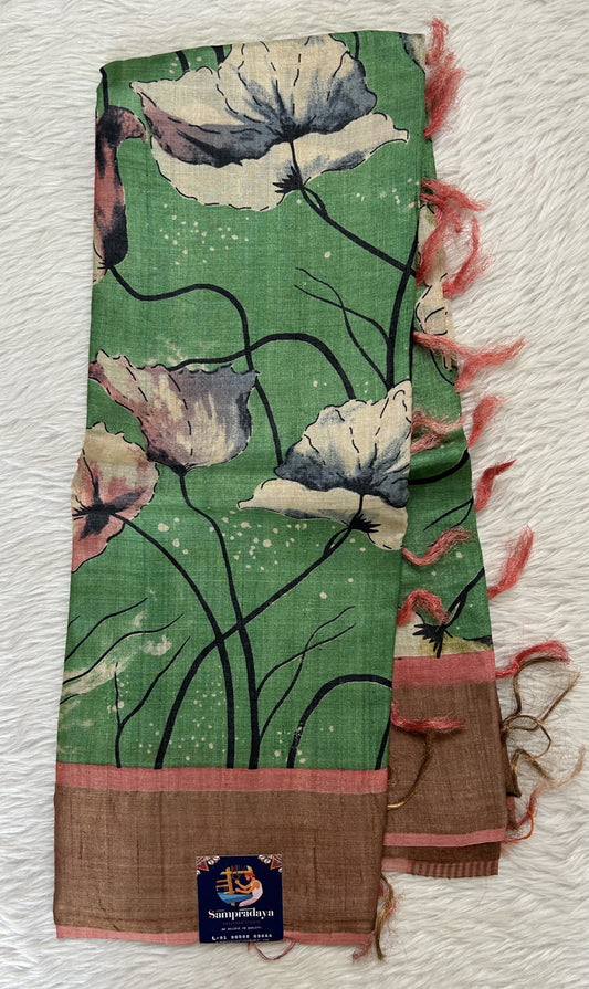 Tussar Silk Saree Green colored complemented with a Peach Colored Gold Zari border. - Sampradaya Designer Studio